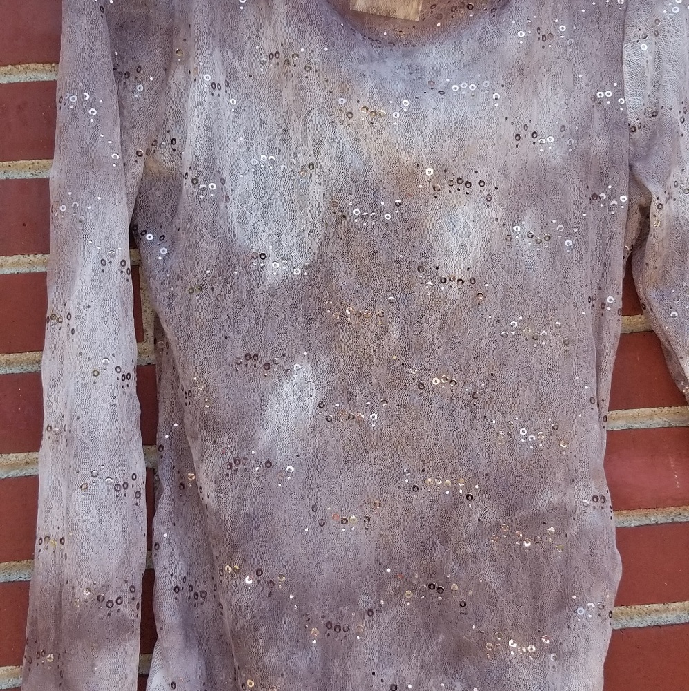 Cute sheer shirt with rouched sides